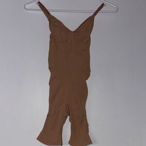 SKIMS  tan shapewear size small/medium